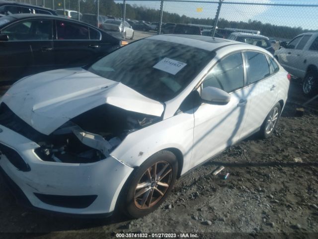 2015 FORD FOCUS 1FADP3F23FL263166 Photo 1