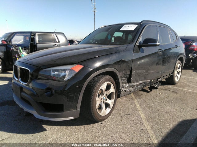 2015 BMW X1, VIN: WBAVM1C51FV317155