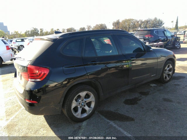 2015 BMW X1, VIN: WBAVM1C51FV317155