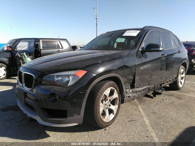 2015 BMW X1, VIN: WBAVM1C51FV317155