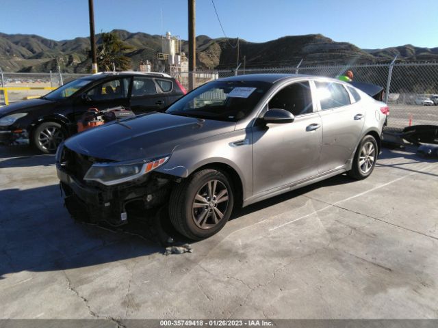 5XXGT4L36GG100356 KIA Optima Lx