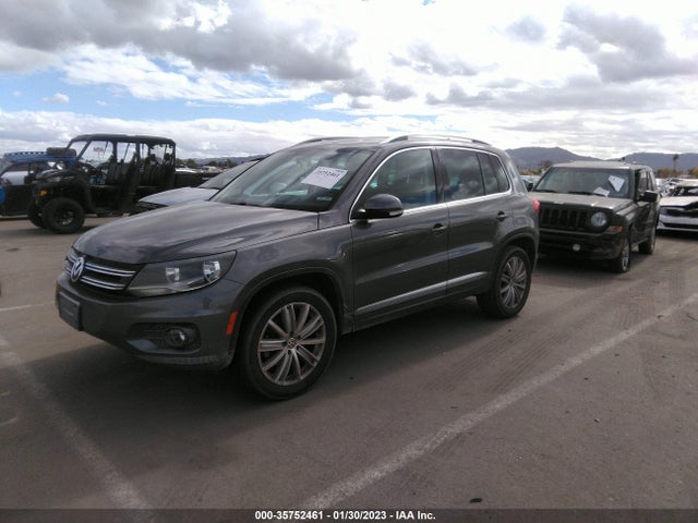 2013 VOLKSWAGEN TIGUAN SE W/SUNROOF & NAV VIN: WVGAV7AX7DW001493