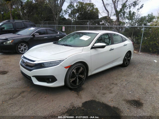 2016 HONDA CIVIC SEDAN TOURING VIN: 19XFC1F90GE022353