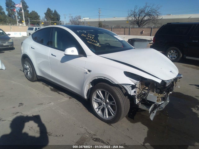 2021 Tesla Model Y, VIN: 5YJYGAEE9MF270179