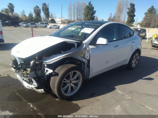 2021 Tesla Model Y, VIN: 5YJYGAEE9MF270179