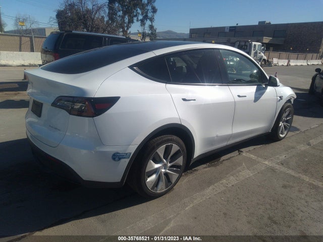 2021 Tesla Model Y, VIN: 5YJYGAEE9MF270179