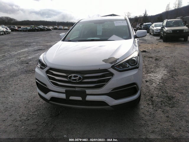 2018 Hyundai Santa Fe, VIN: 5NMZTDLBXJH077625