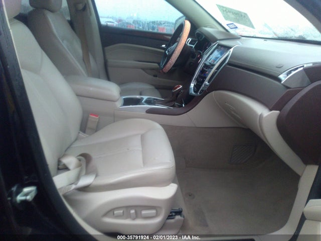 2015 Cadillac SRX, VIN: 3GYFNBE33FS548516