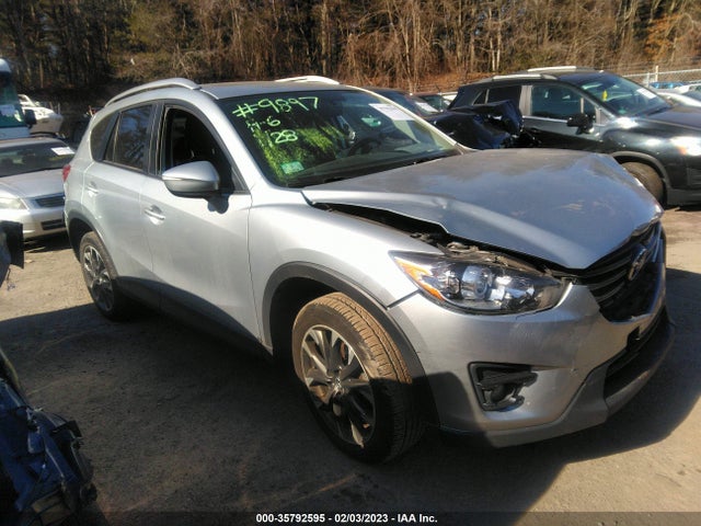 2016 Mazda CX-5, VIN: JM3KE4DY1G0909366