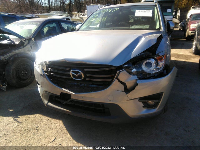 2016 Mazda CX-5, VIN: JM3KE4DY1G0909366