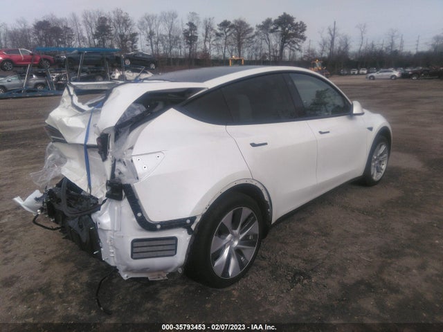 2021 Tesla Model Y, VIN: 5YJYGAEE9MF236520