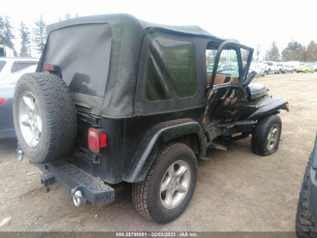 1J4FA59S91P310093 Jeep Wrangler Sahara