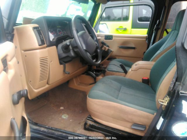 1J4FA59S91P310093 Jeep Wrangler Sahara