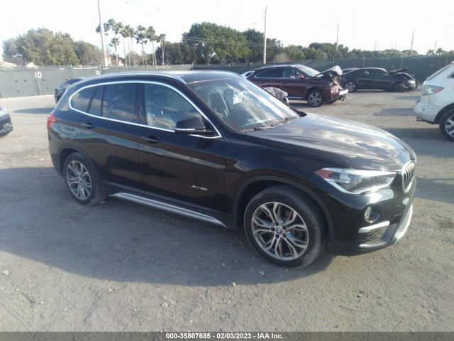 2016 BMW X1, VIN: WBXHT3Z32G4A48889