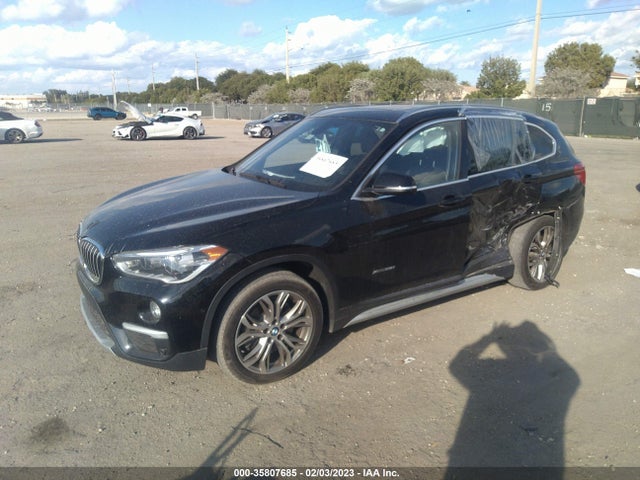 2016 BMW X1, VIN: WBXHT3Z32G4A48889