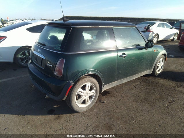 2006 MINI COOPER HARDTOP VIN: WMWRC33516TK16712