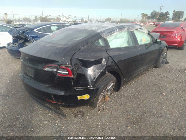 Tesla Model 3 Standard Range Plus 2021 5YJ3E1EA5MF067044 Image 4