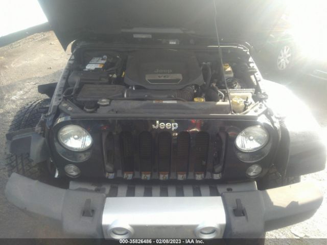 1C4BJWEGXEL142683 Jeep Wrangler Unlimited Sahara