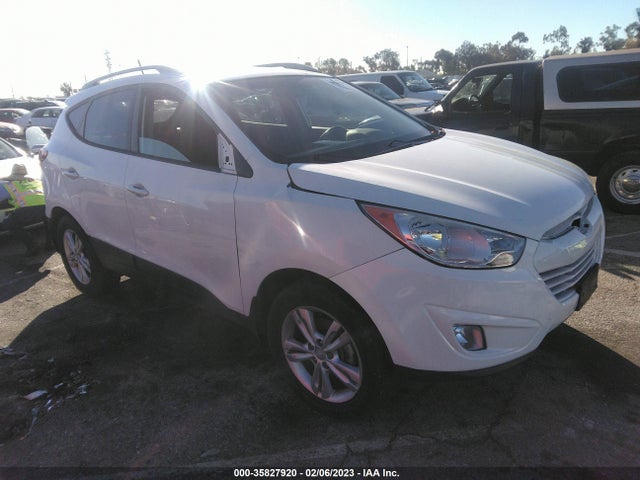 2013 KM8JU3AC9DU653696 main image