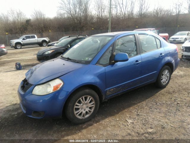 JS2YC5A32C6301960 Suzuki SX4 LE