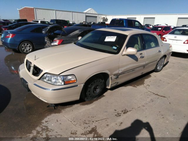 1LNHM83W83Y611014 Lincoln Town Car Cartier
