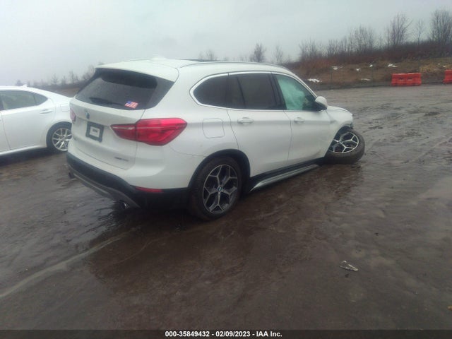 2018 BMW X1, VIN: WBXHT3C30J5L30679