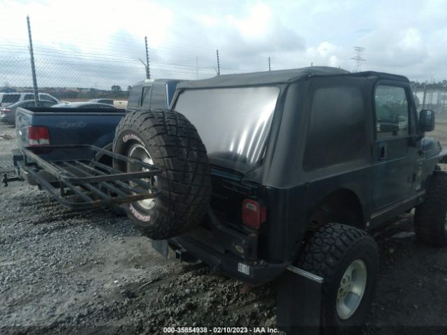 1J4FA59S61P328132 Jeep Wrangler Sahara