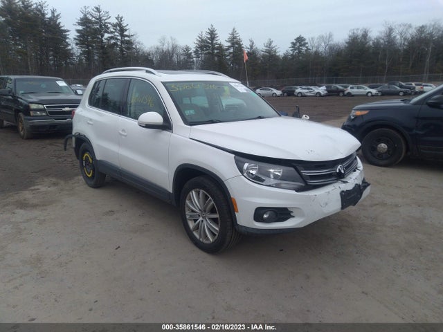 2012 VOLKSWAGEN TIGUAN SE W/SUNROOF & NAV VIN: WVGBV7AX2CW509244