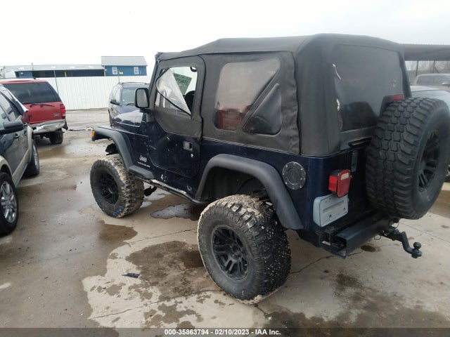 Jeep Wrangler 2004 1J4FA29164P700983 Image 3
