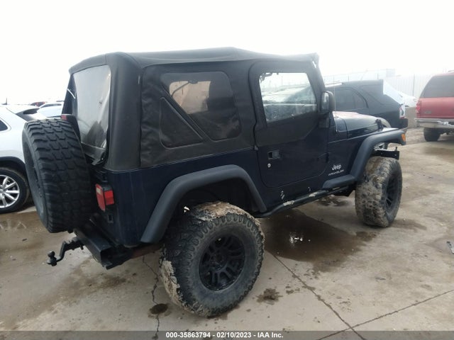 Jeep Wrangler 2004 1J4FA29164P700983 Image 4