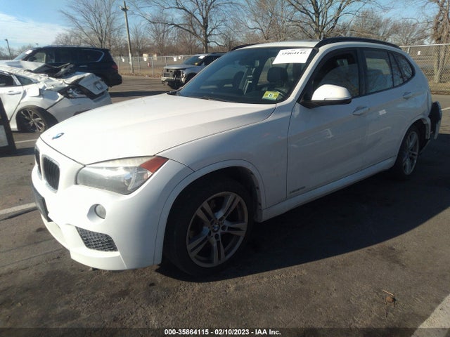 2014 BMW X1, VIN: WBAVL1C56EVY11495