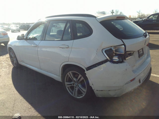 2014 BMW X1, VIN: WBAVL1C56EVY11495