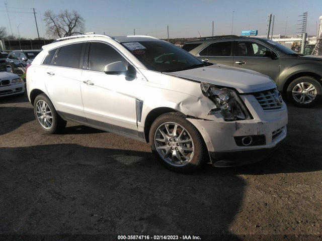 2014 Cadillac SRX, VIN: 3GYFNCE39ES659320