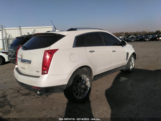 2014 Cadillac SRX, VIN: 3GYFNCE39ES659320