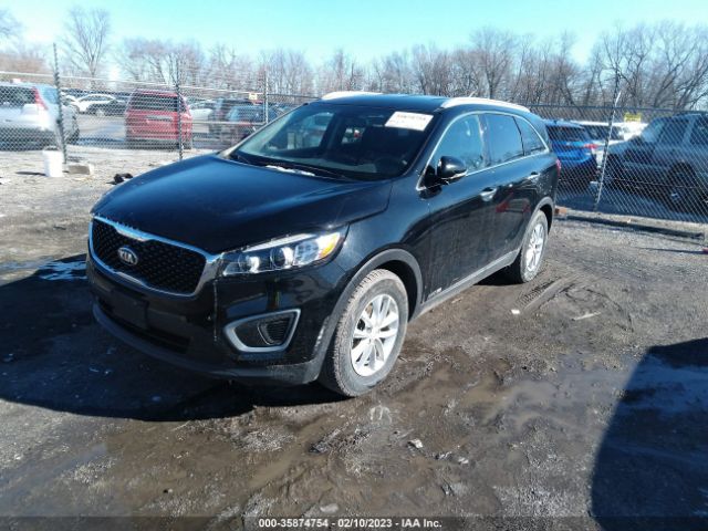 5XYPGDA57GG002070 KIA SORENTO LX
