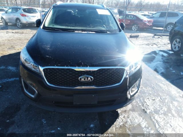 5XYPGDA57GG002070 KIA SORENTO LX