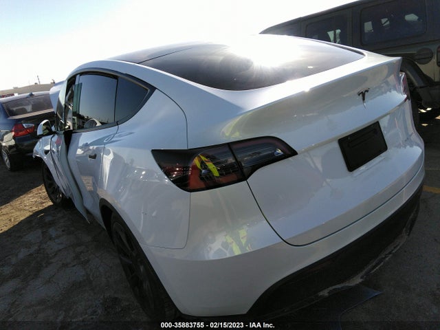 2023 Tesla Model Y, VIN: 7SAYGAEE5PF601721