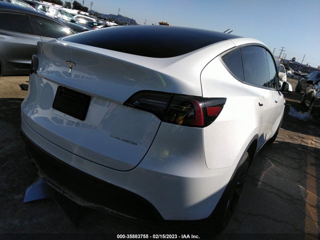 2023 Tesla Model Y, VIN: 7SAYGAEE5PF601721