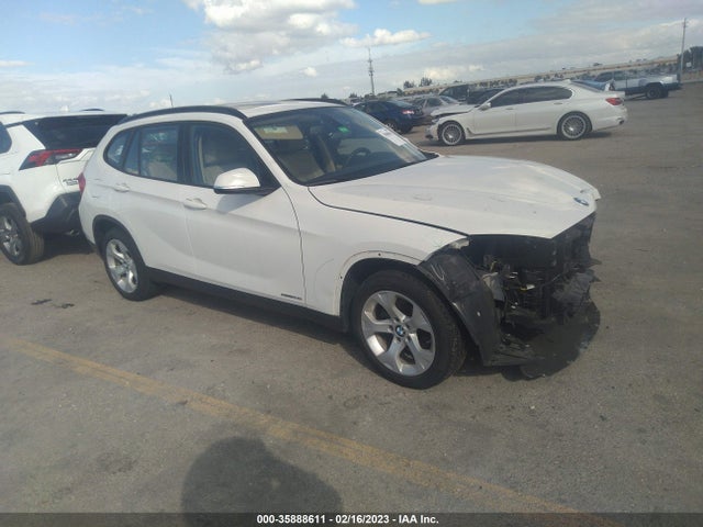 2015 BMW X1, VIN: WBAVM1C5XFV498787