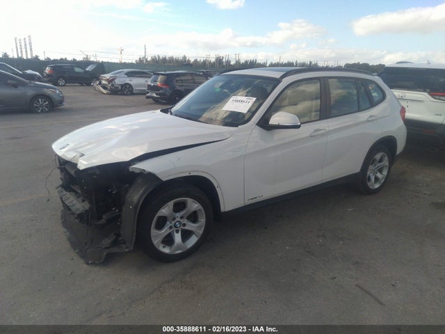 2015 BMW X1, VIN: WBAVM1C5XFV498787