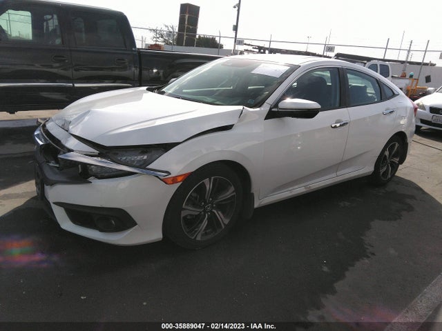 2017 HONDA CIVIC SEDAN TOURING VIN: 2HGFC1F99HH657448