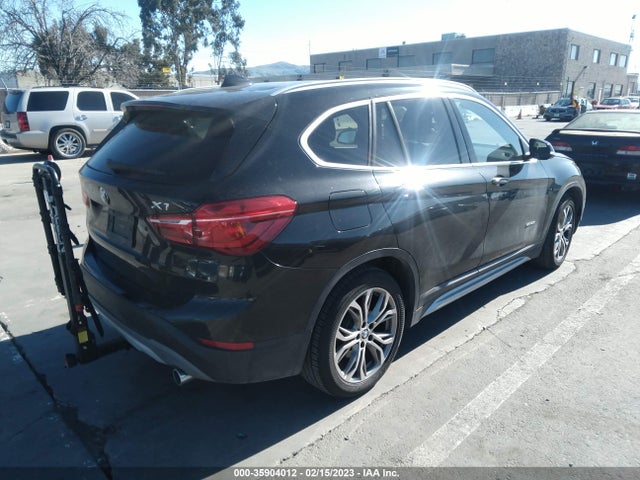 2016 BMW X1, VIN: WBXHT3Z35G4A50328