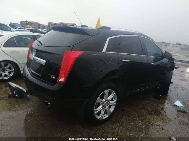 2015 Cadillac SRX, VIN: 3GYFNGE38FS585249