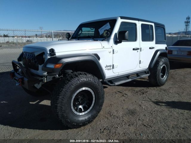1C4HJXDN1JW265880 Jeep Wrangler Unlimited Sport