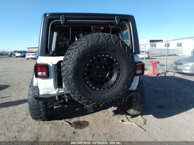 1C4HJXDN1JW265880 Jeep Wrangler Unlimited Sport