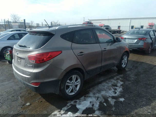 2011 HYUNDAI TUCSON GLS VIN: KM8JUCAC7BU169085