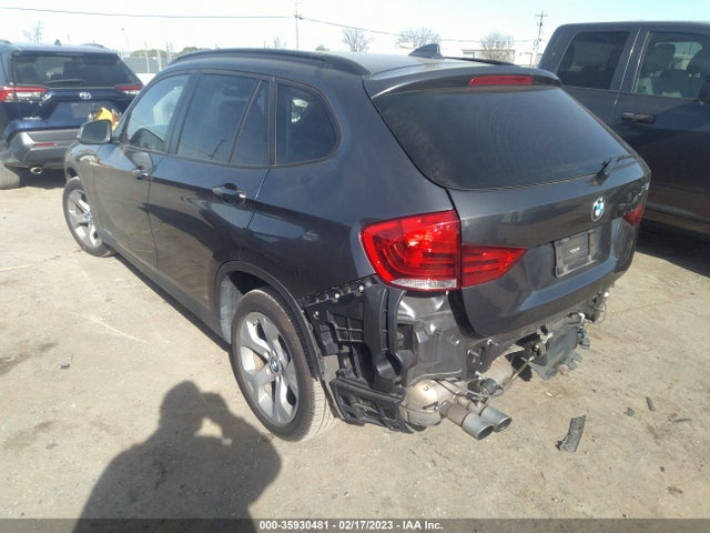 2015 BMW X1, VIN: WBAVM1C56FV318821