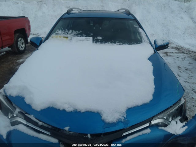 2018 Toyota RAV4, VIN: JTMRJREV2JD211532