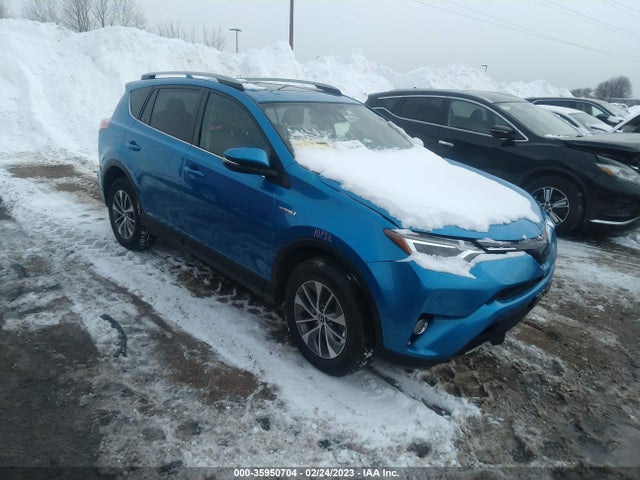 2018 Toyota RAV4, VIN: JTMRJREV2JD211532