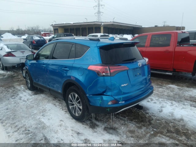 2018 Toyota RAV4, VIN: JTMRJREV2JD211532